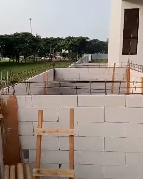 Construction progress video: blockwork and rebar at the back of the house